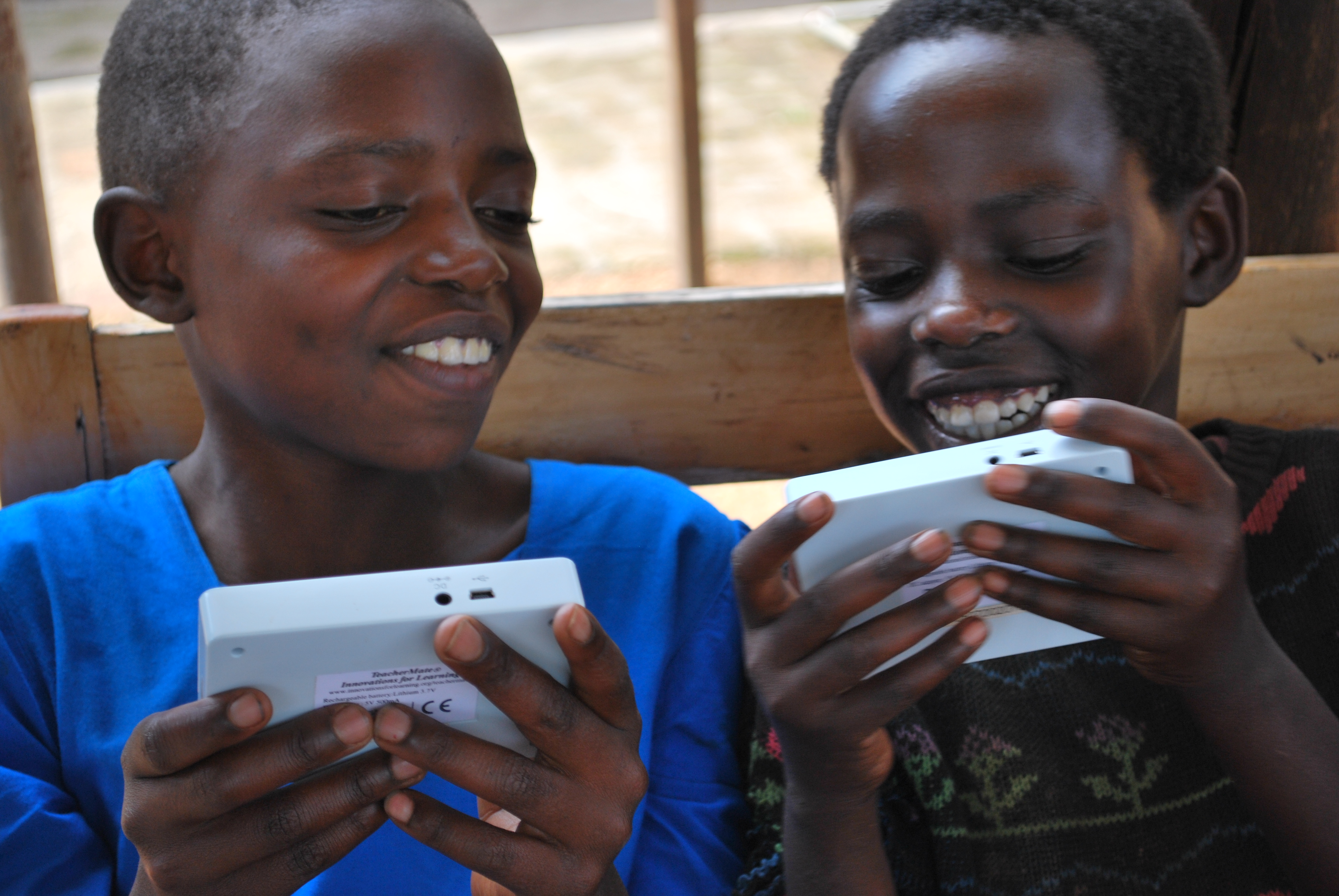Rural village students in Rwanda develop literacy and numeracy skills through mobile devices
